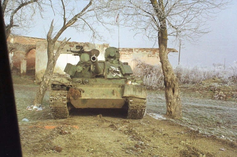 A Serbian tank in January 1999 in Kosovo's northern Podujevo region, as Serb forces advanced toward positions of ethnic Albanian guerillas