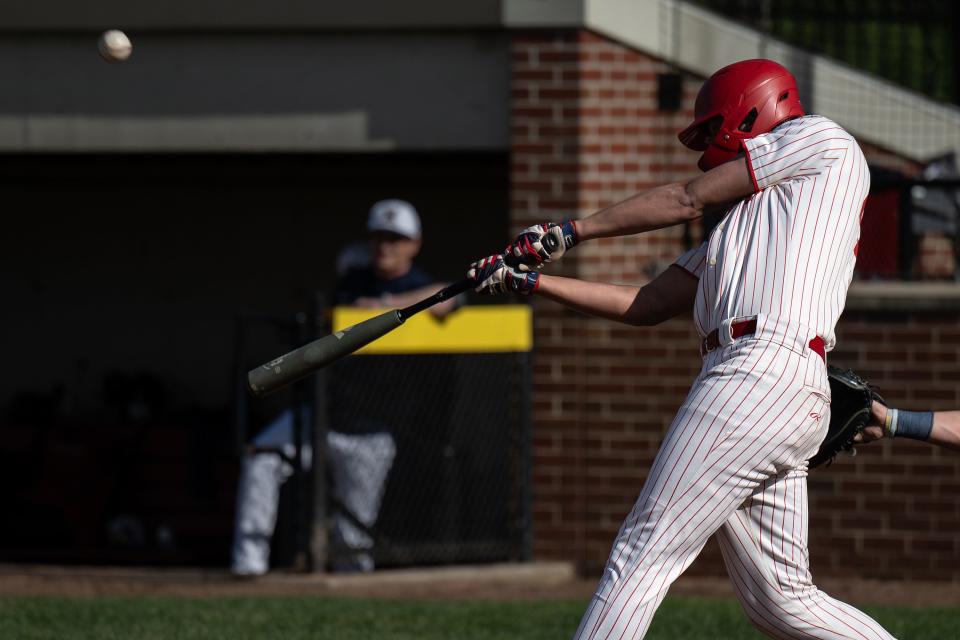 St. John's Noah Bagaard hits one deep to center, but it was caught by Xaverian.