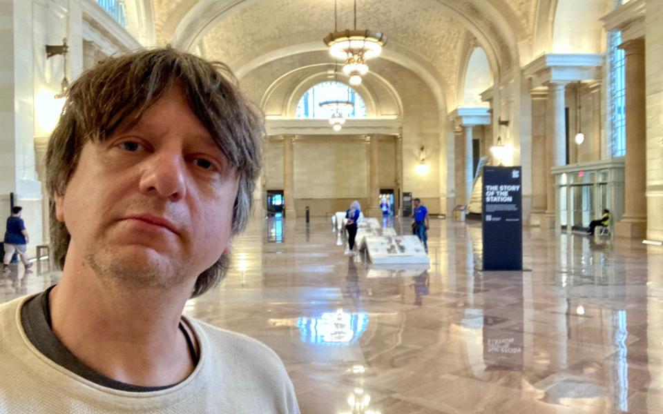 Our writer pictured at the entrance of the re-opened station