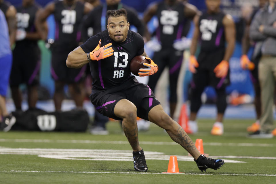 Derrius Guice, a first-round talent, was the seventh running back off the board when Washington ended his NFL draft slide late in the second round. (AP)