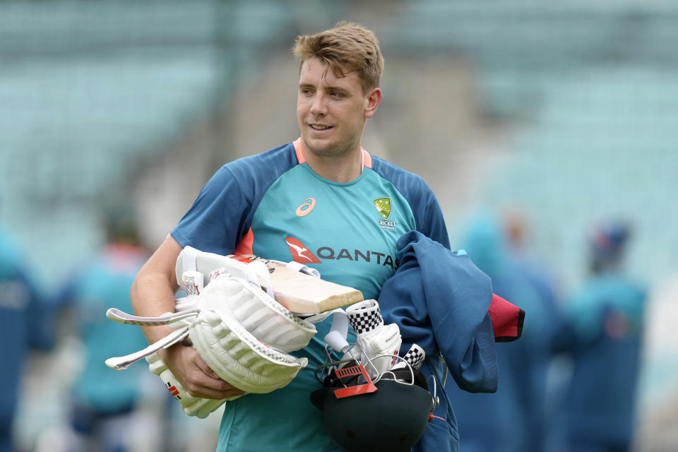 Australia's Cameron Green carries his equipment during a training session at The Oval cricket ground in London, Monday, June 5, 2023. Australia will play India in the World Test Championship 2023 Final at The Oval starting June 7. (AP Photo/Kirsty Wigglesworth)