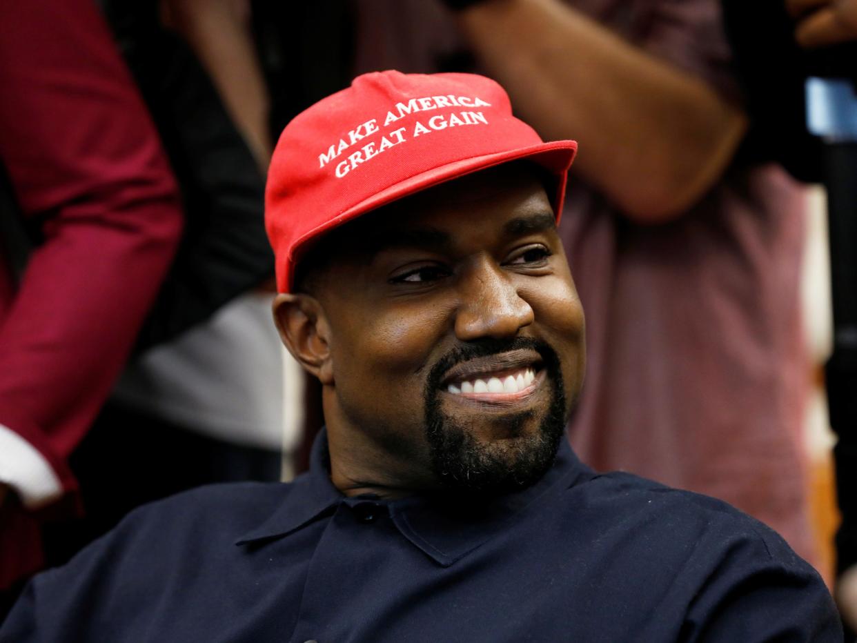 Rapper Kanye West smiles during a meeting with U.S. President Donald Trump to discuss criminal justice reform at the White House in Washington, U.S., October 11, 2018. REUTERS/Kevin Lamarque