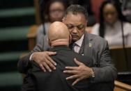 Rep. Elijah Cummings is hugged by Reverend Jesse Jackson (R) during Freddie Gray's funeral at New Shiloh Baptist Church April 27, 2015 in Baltimore, Maryland