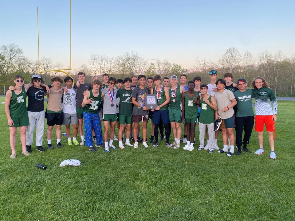 Kinnelon celebrates after defending its Northwest Jersey Athletic Conference boys track and field title on May 11, 2022.