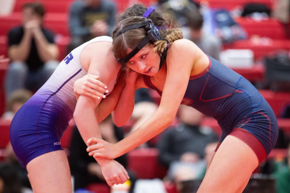Seaman's Taylie Heston competes against Piper's Rylee Burke in their class 120 bout at the United Kansas Conference Championship Saturday, February 3, 2024, inside Shawnee Heights High School.