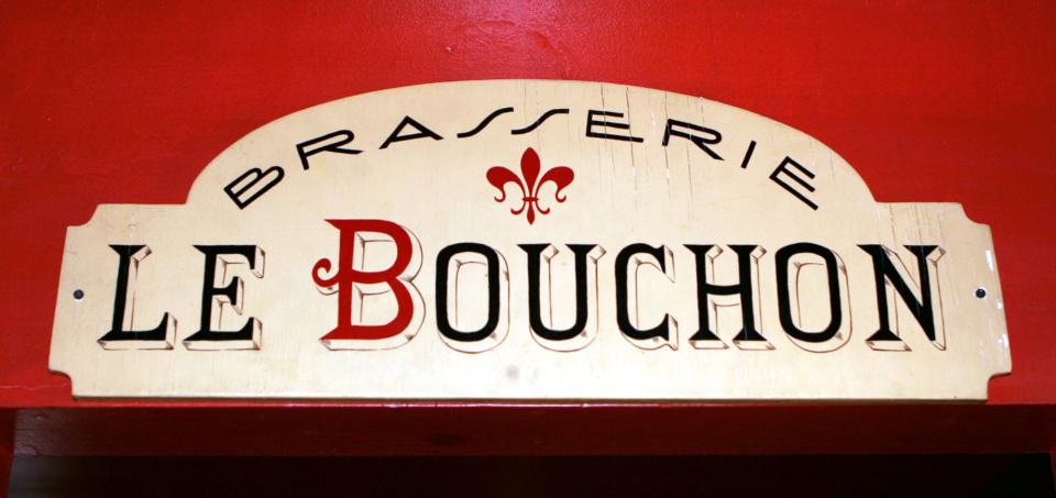 A sign near the dining room at Le Bouchon on Main Street in Cold Spring.