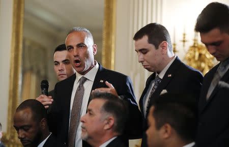 Marjory Stoneman Douglas High School parent Andrew Pollack discusses the death of his daughter Meadow in the Parkland school shooting as he and his sons attend a listening session on school safety and shootings with U.S. President Donald Trump at the White House in Washington, U.S., February 21, 2018. REUTERS/Jonathan Ernst