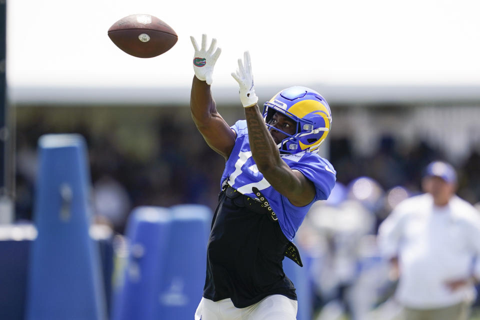 Los Angeles Rams wide receiver Van Jefferson (12) participates in drills at the NFL football team's practice facility in Irvine, Calif. Friday, July 29, 2022. (AP Photo/Ashley Landis)