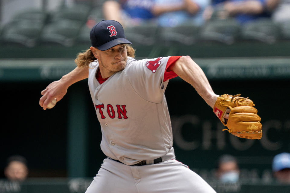 Boston Red Sox starting pitcher Garrett Richards works against the Texas Rangers during the first inning of a baseball game Sunday, May 2, 2021, in Arlington, Texas. (AP Photo/Jeffrey McWhorter)