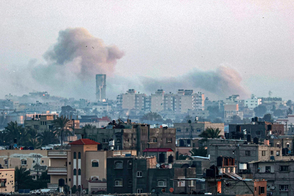 This photograph taken from Rafah shows smoke billowing over Khan Yunis in the southern Gaza Strip during Israeli bombardment on January 16, 2024, amid ongoing battles between Israel and the Palestinian militant group Hamas. (Photo by AFP) (Photo by -/AFP via Getty Images)