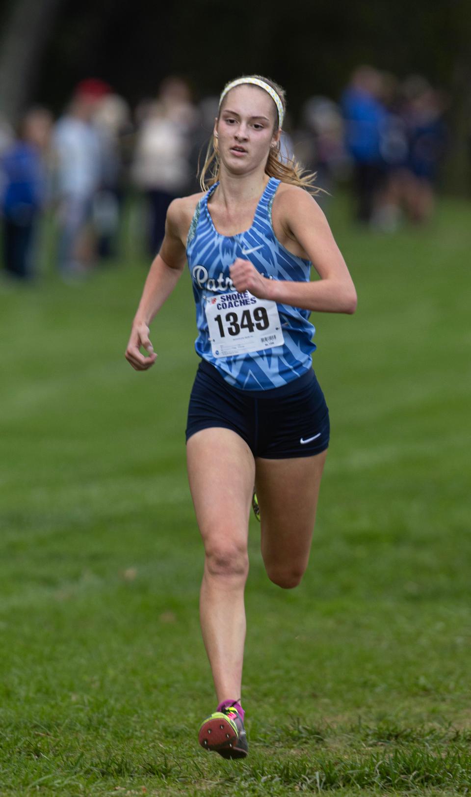 Emma Zawatski of Freehold Township took first in the girls varisty race at the Monmouth County Cross Country Championships at Holmdel Park in Holmdel, NJ on October 10, 2023.