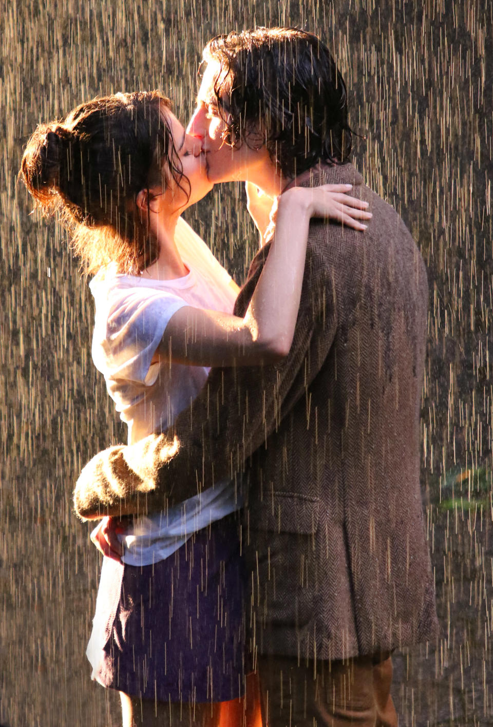 September: Selena Perfects the Art of Kissing in the Rain