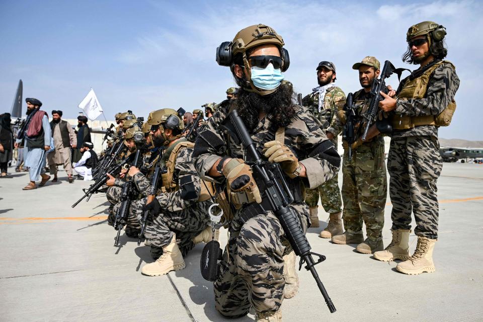 Taliban Badri special force fighters take a position at the airport in Kabul on Aug. 31, 2021, after the US has pulled all its troops out of the country to end a brutal 20-year war -- one that started and ended with the hardline Islamist in power.