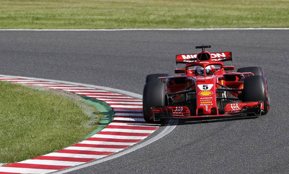 Ferrari driver Sebastian Vettel of Germany steers his car duirng the Japanese Formula One Grand Prix at the Suzuka Circuit in Suzuka, central Japan, Sunday, Oct. 7, 2018. (AP Photo/Toru Takahashi)