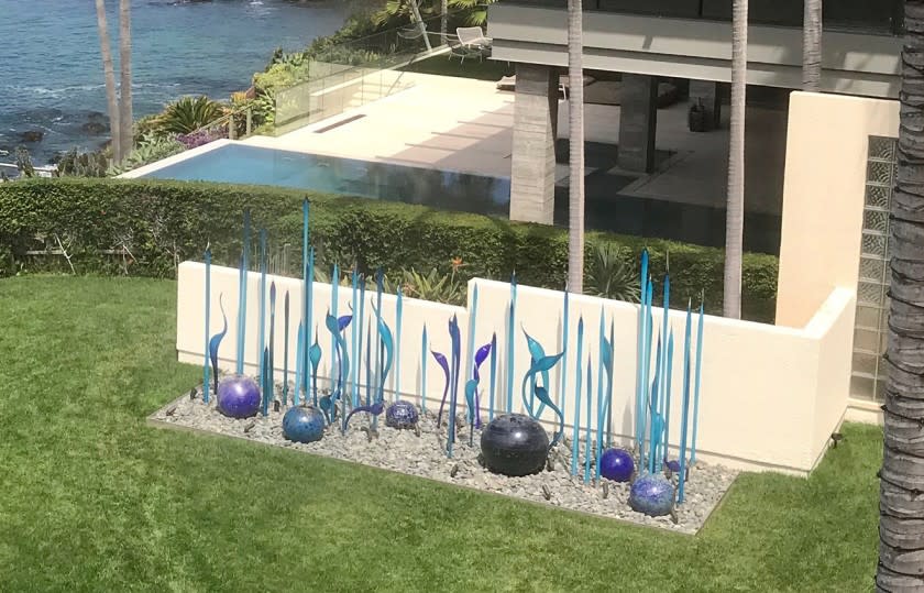 Blown glass sculpture by artist Dale Chihuly installed at the Laguna Beach yard of Bill Gross and Amy Schwartz.