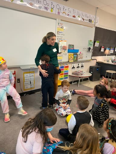 KOIN 6 anchor Emily Burris celebrates National Read Across America Day with students at John Wetten Elementary School in Gladstone on Mar. 1, 2024 (KOIN)