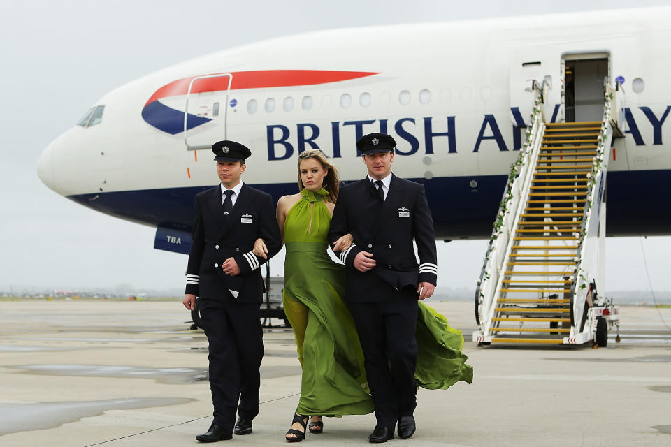 A BA ad featuring Georgia May Jagger flanked by pilots. Photo: Getty