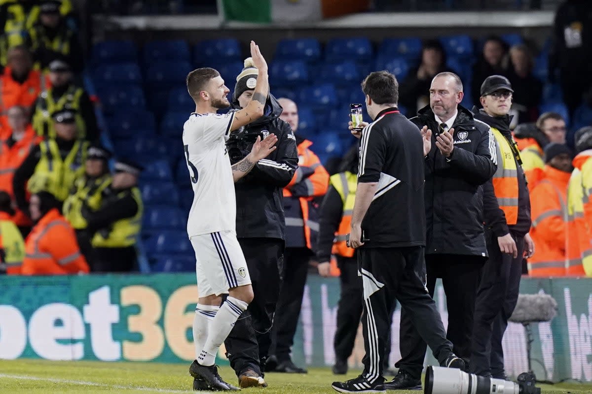 Leeds United’s Mateusz Klich waves goodbye (PA Wire)