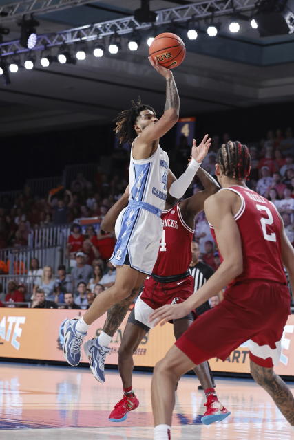 North Carolina's RJ Davis shoots the ball during an NCAA college basketball game in the Battle 4 Atlantis at Paradise Island, Bahamas, Friday, Nov. 24, 2023. (Tim Aylen/Bahamas Visual Services via AP)