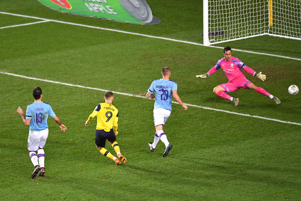 OXFORD, ENGLAND - DECEMBER 18: Matty Taylor of Oxford United scores his team's first goal  during the Carabao Cup Quarter Final match between Oxford United and Manchester City at Kassam Stadium on December 18, 2019 in Oxford, England. (Photo by Justin Setterfield/Getty Images)