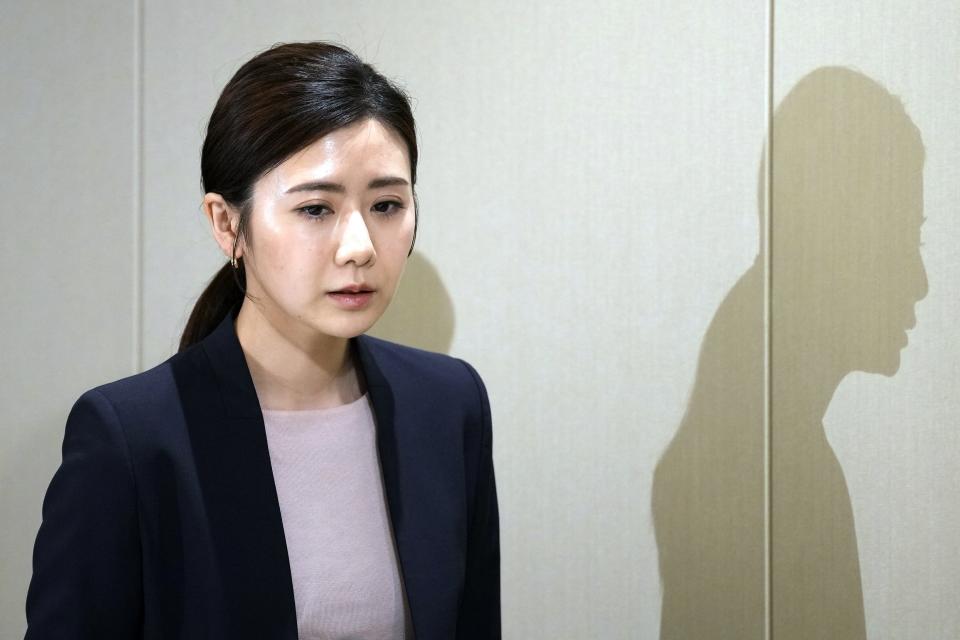 Former Japanese table tennis player and Olympic medallist Ai Fukuhara prepares to make a brief statement during a news conference about a child-custody agreement she forged with ex-husband Chiang Hung-chieh of Taiwan at the Foreign Correspondents' Club of Japan (FCCJ) Friday, March 15, 2024 in Tokyo. (AP Photo/Eugene Hoshiko)