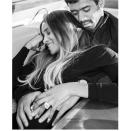 <p>The singer shared a black-and-white photograph of herself and her husband on Instagram to announce the news of her pregnancy.</p><p>'On this special birthday I received an abundance of love from friends and family.. and I'm excited to finally share one of the Greatest Gifts of All that God could give..[sic]' she captioned the adorable photo. </p><p><a href="https://www.instagram.com/p/BMAv1I1Dr8A/" rel="nofollow noopener" target="_blank" data-ylk="slk:See the original post on Instagram;elm:context_link;itc:0;sec:content-canvas" class="link ">See the original post on Instagram</a></p>