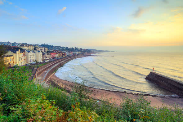 Sunrise overlooking the beach at Dawlish in South Devon