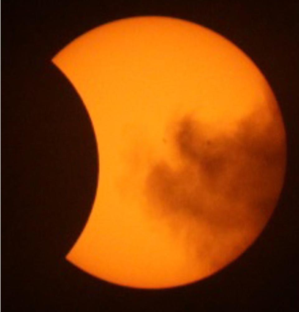 The moon begins to pass in front of the sun during a total solar eclipse on Aug. 21, 2017.