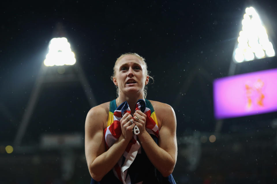 Sally Pearson of Australia celebrates after winning the gold medal in the Women's 100m Hurdles Final on Day 11 of the London 2012 Olympic Games at Olympic Stadium on August 7, 2012 in London, England. (Photo by Streeter Lecka/Getty Images)