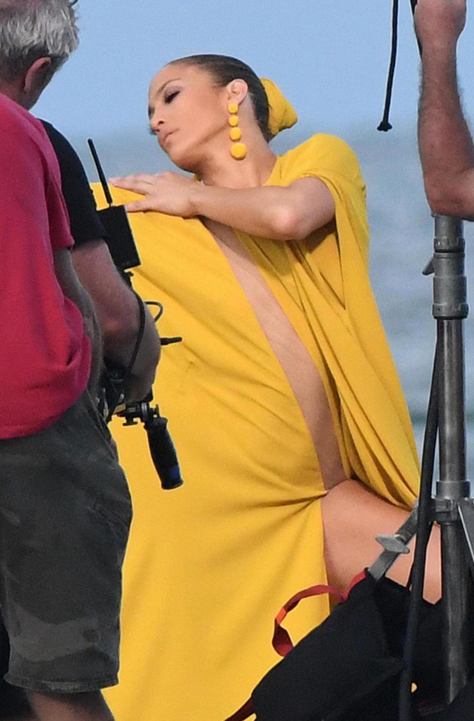 The 47-year-old musician left little to the imagination, wearing a semi-sheer yellow dress.