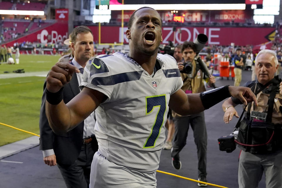 Seattle Seahawks quarterback Geno Smith (7) reacts toward fans after an NFL football game against the Arizona Cardinals in Glendale, Ariz., Sunday, Nov. 6, 2022. (AP Photo/Matt York)