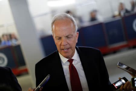 FILE PHOTO: Senator Jerry Moran (R-KS) speaks with reporters about the withdrawn Republican health care bill on Capitol Hill in Washington, U.S., July 18, 2017. REUTERS/Aaron P. Bernstein