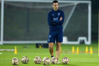 Argentina's head coach Lionel Scaloni walks on the field during a training session ahead of the final soccer match between Argentina and France in Doha, Thursday, Dec. 15, 2022. (AP Photo/Natacha Pisarenko)
