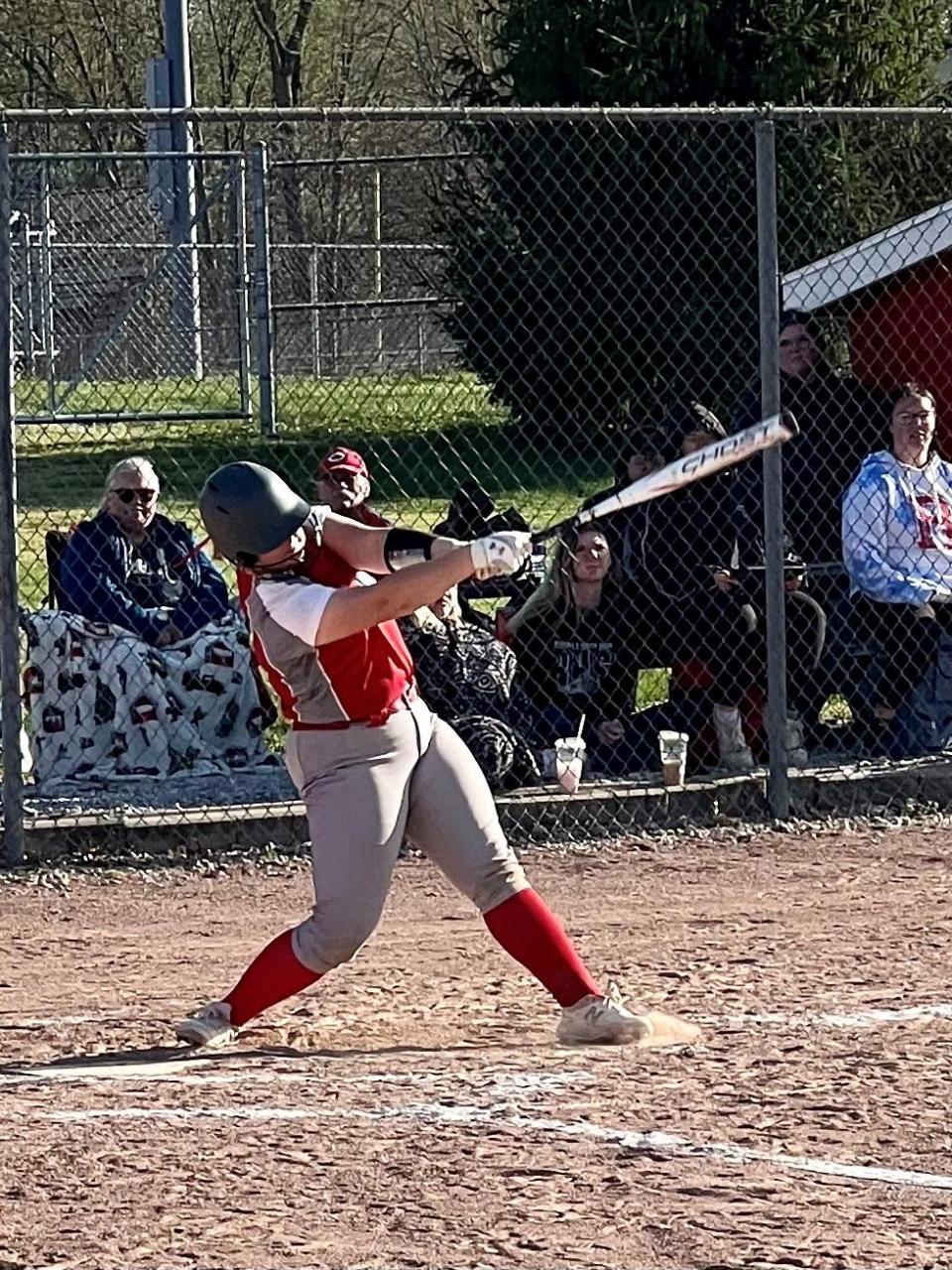 Elgin's Ava Baker swings at a pitch during a softball game at Ridgedale last season.