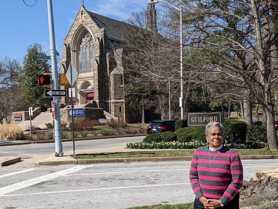 Rev. Canon Christine McCloud of of the Episcopal Diocese of Maryland poses outside a cathedral in Baltimore, Maryland, in March 2022.