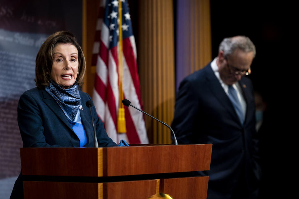 UNITED STATES - APRIL 21: Speaker of the House Nancy Pelosi, D-Calif.,and Senate Minority Leader Chuck Schumer, D-N.Y., hold a socially distanced press conference in the Capitol after the Senate passed coronavirus relief during a pro forma session on Tuesday, April 21, 2020. The Senate passed a $483.4 billion economic relief measure Tuesday that would replenish a popular small-business loan program and provide funding for hospitals facing financial shortfalls due to COVID-19.(Photo By Bill Clark/CQ-Roll Call, Inc via Getty Images)