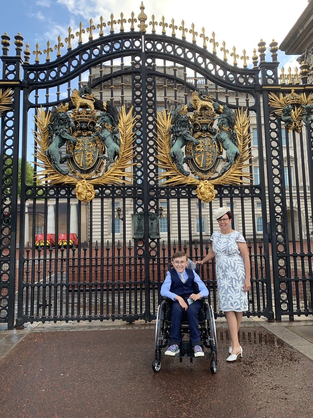 Tobias Weller, 11, with his mother Ruth Garbutt at Buckingham Palace (Family handout/PA) (PA Media)