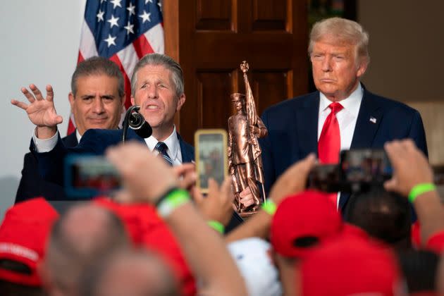 NYC PBA President Patrick Lynch (center) presents then-President Donald Trump with a statue on Aug. 14, 2020. The union's endorsement of Trump has elicited criticism. (Photo: JIM WATSON/Getty Images)