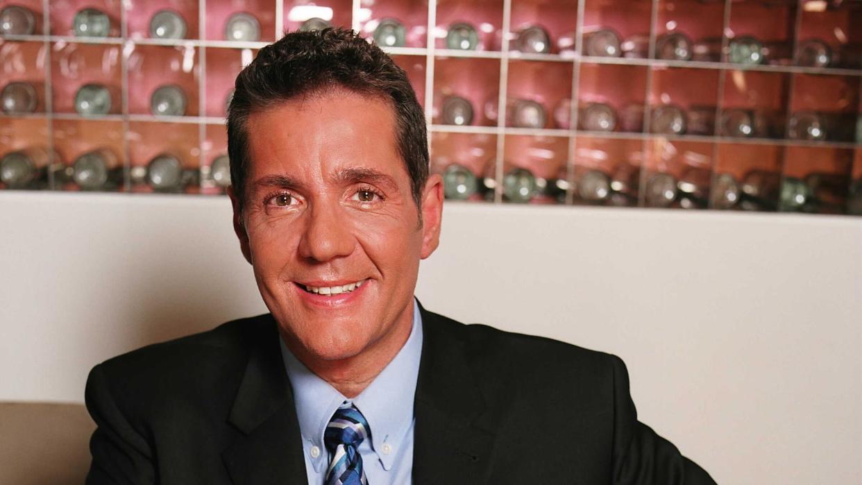 Television presenter Dale Winton photographed in a cafe in 2003