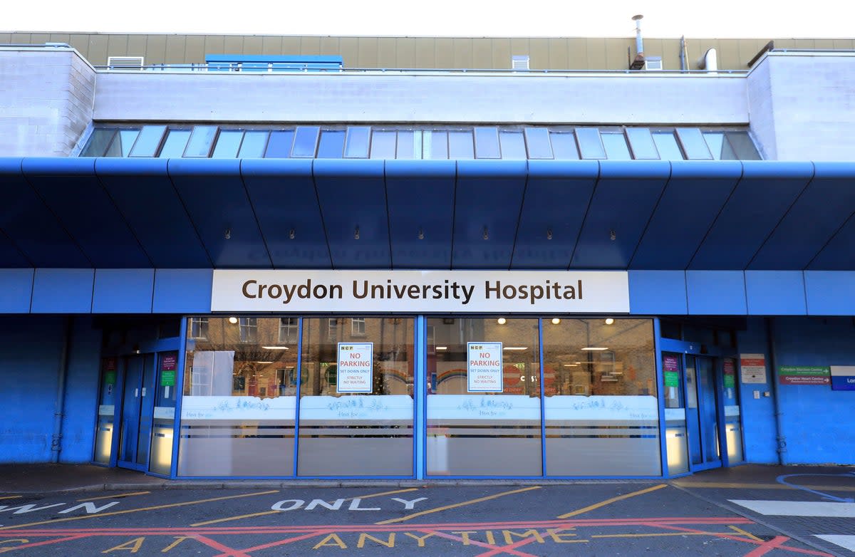 Parts of Croydon University Hospital were closed off after a woman was rushed to hospital over fears she had ingested poison  (AP)