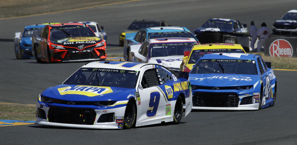 Chase Elliott (9) leads through a turn as he competes during a NASCAR Sprint Cup Series auto race Sunday, June 23, 2019, in Sonoma, Calif. (AP Photo/Ben Margot)