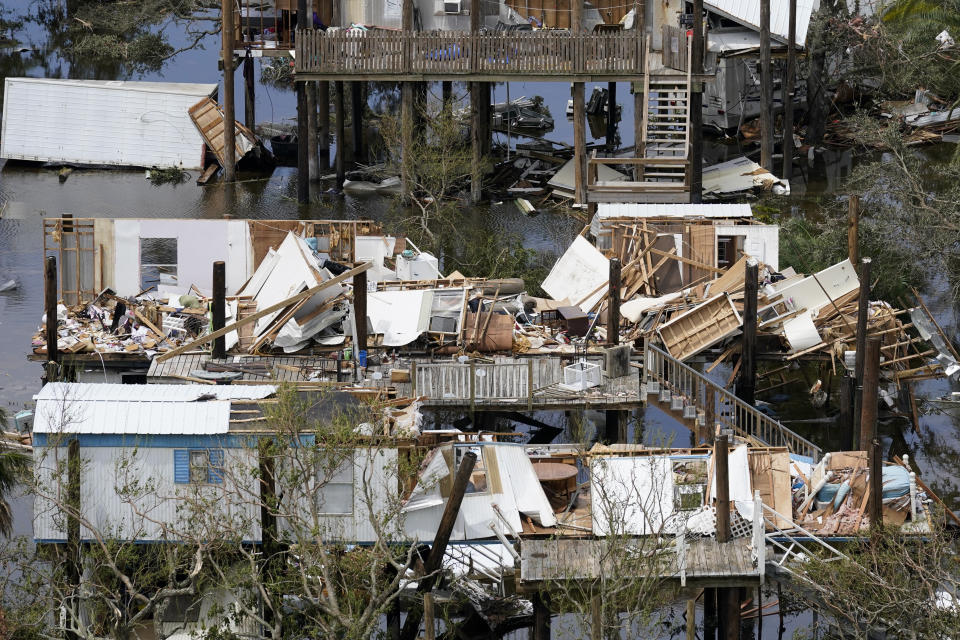 The remains of destroyed homes are seen in the aftermath of Hurricane Ida in Grand Isle, La., Tuesday, Aug. 31, 2021. (AP Photo/Gerald Herbert)