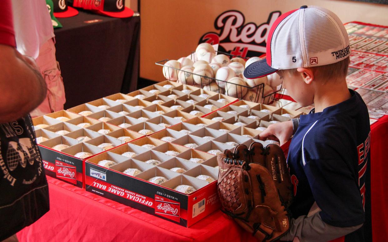 The Reds Authentics store at Great American Ball Park sells Cincinnati Reds memorabilia, including equipment that was used during games.