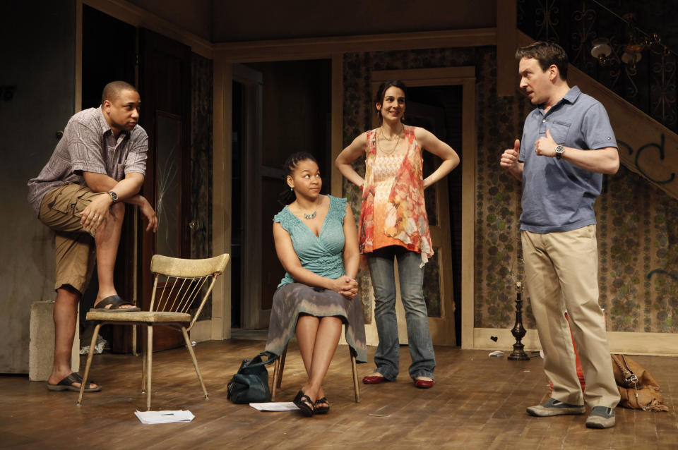 FILE - In this theater publicity file photo released by The Publicity Office, from left, Damon Gupton, Crystal A. Dickinson, Annie Parisse and Jeremy Shamos are shown in a scene from Bruce Norris' "Clybourne Park," at Playwrights Horizons in New York. The Pulitzer Prize-winning playwright of "Clybourne Park," says he withdrew permission for a Berlin theater company to produce the play after learning that one of the actors would perform the roles in blackface. (AP Photo/The Publicity Office, Joan Marcus, File)