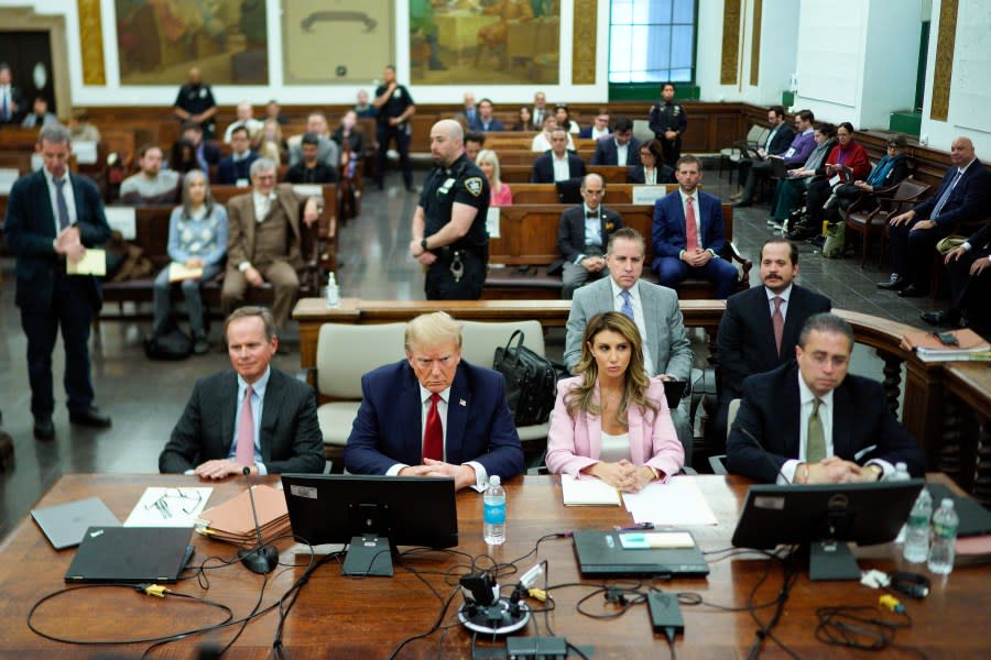 Former President Donald Trump, second from left, sits at the defense table with his attorney's Christopher Kise, left, Alina Habba, second from right, and Clifford Robert at New York Supreme Court, Thursday, Dec. 7, 2023, in New York. (AP Photo/Eduardo Munoz Alvarez, Pool)