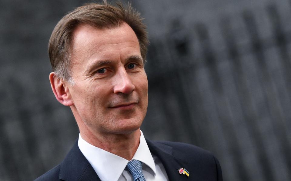 In this file photo taken on October 25, 2022 Britain's re-appointed Chancellor of the Exchequer Jeremy Hunt - DANIEL LEAL/AFP