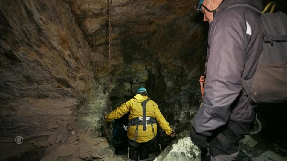 Guests descend underground in the Snowdonia, Wales, in a journey to reach the world's deepest hotel. March 2024.  / Credit: CBS News