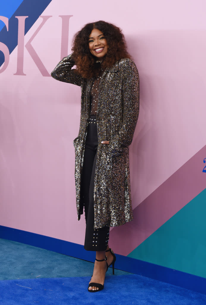 <p>Loving that awesome hair, and the super-glam get-up. (Photo: Getty Images) </p>