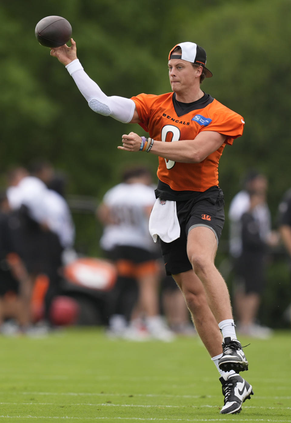 Cincinnati Bengals quarterback Joe Burrow throws during the NFL football team's practice on Tuesday, May 7, 2024, in Cincinnati. (AP Photo/Carolyn Kaster)