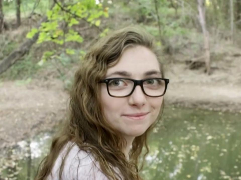 Jacqueline Durand, 22, is pictured before she had most of her face torn off by two rescue dogs last year (CBS News)